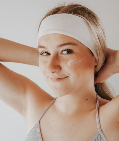 woman using a skincare product