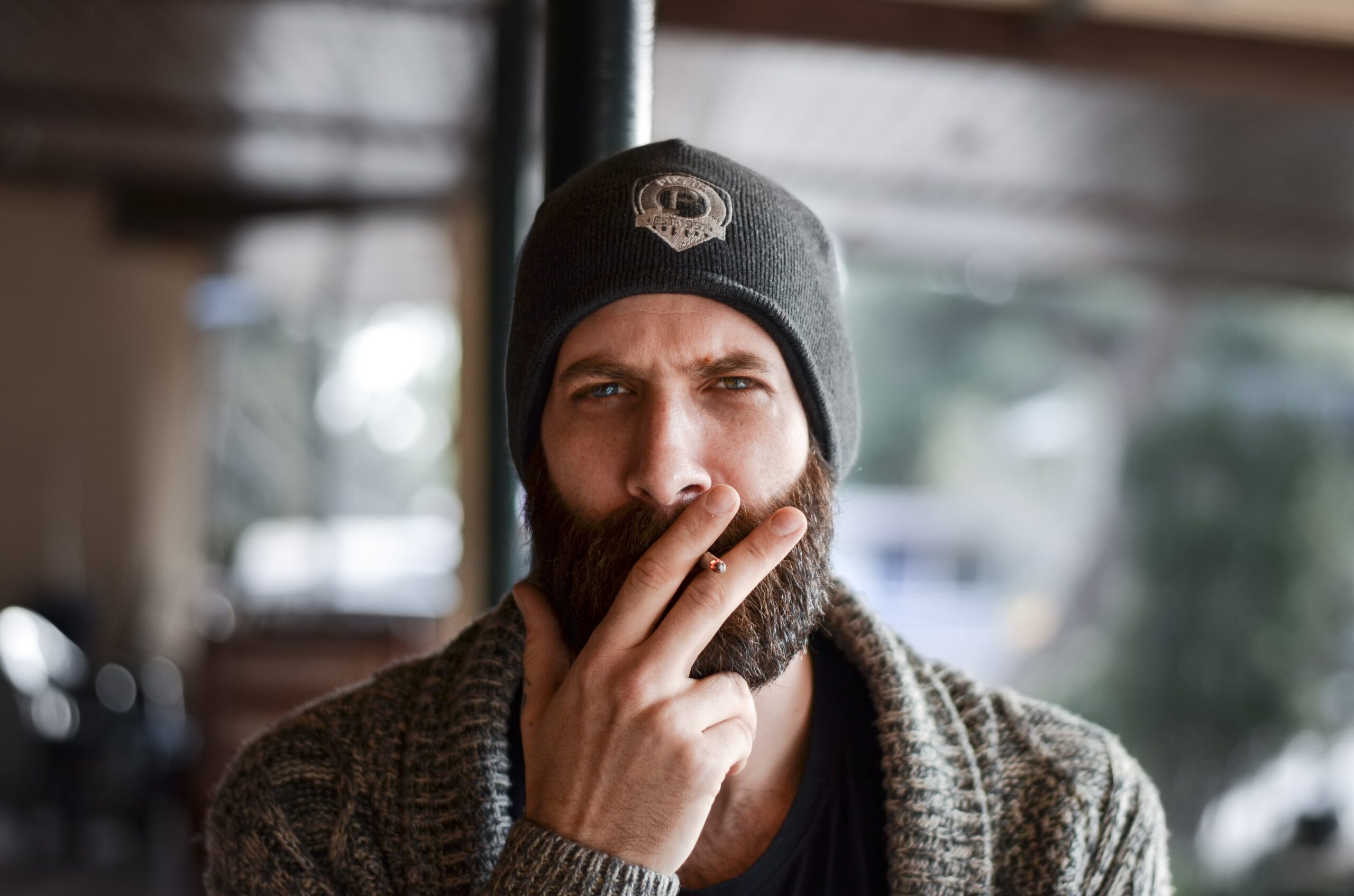 man smoking cigarette stick