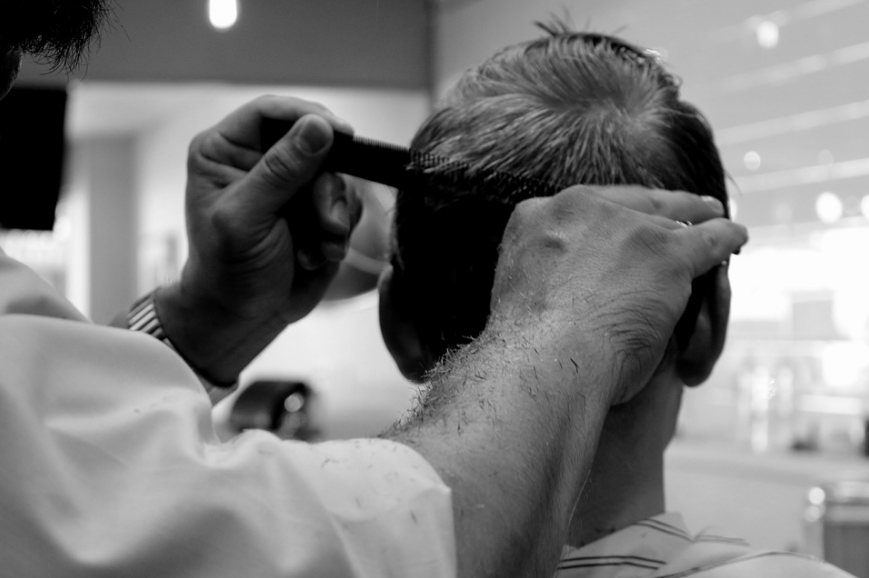 getting a haircut in a barbershop